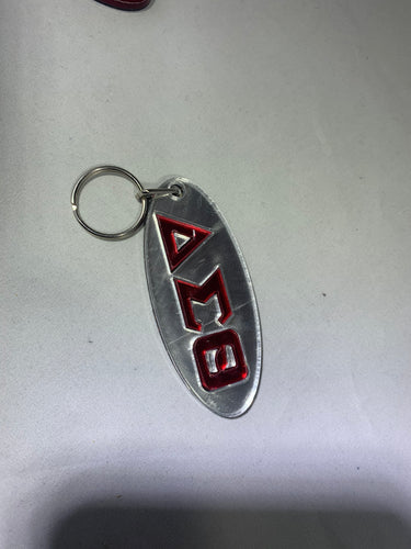 DST Keychain- Mirror Background Red Letters image 0
