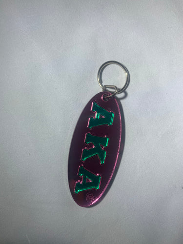 AKA Oval Keychain- Pink Background Green Letters image 0