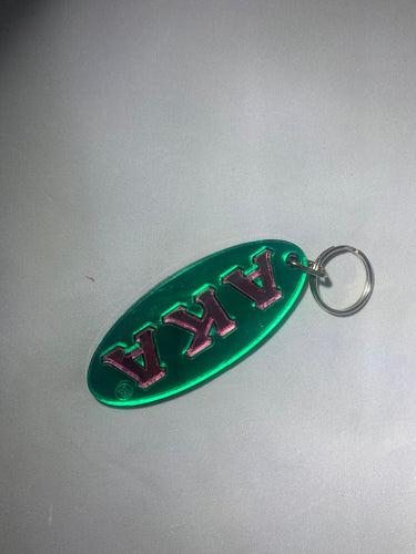 AKA Oval Keychain- Green Background Pink Letters image 0